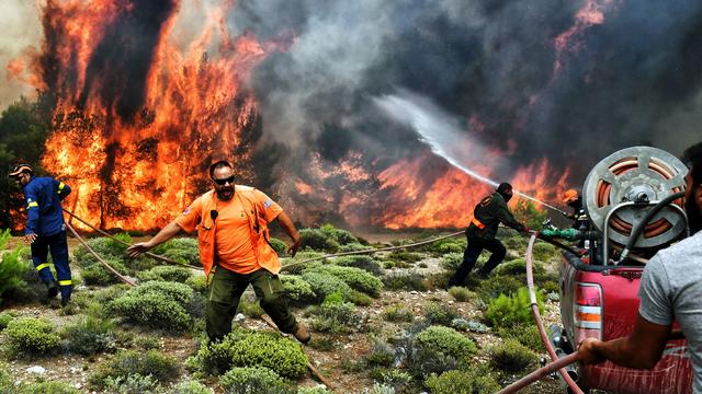 Greek authorities arrest 2 for arson as wildfires across the country continue to burn