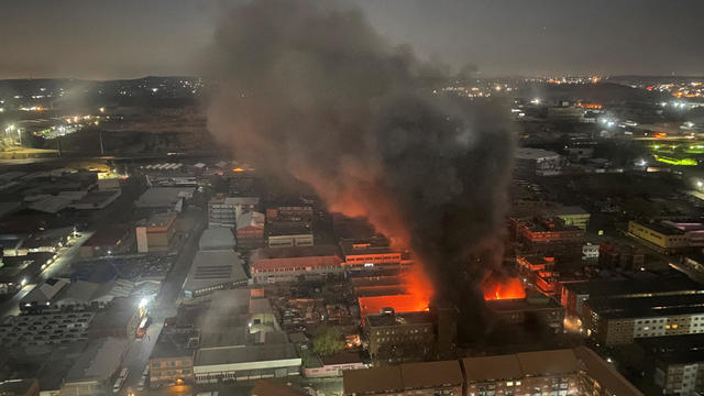 Dozens killed in South Africa as fire guts building many homeless people had moved into