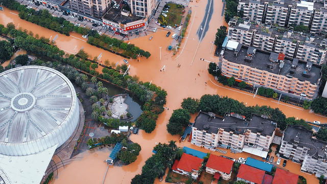 Floodwater sweeps away fire truck in China as Tropical Storm Haikui hits southeast coast