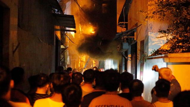 At least 56 dead as a fire engulfs a 9-story apartment building in Vietnam's capital Hanoi