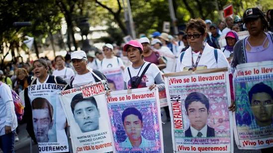 9 years later, families of 43 abducted Mexican students march to demand answers