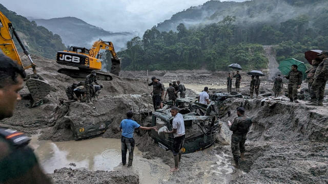 Flood unleashed by India glacial lake burst leaves at least 10 people dead and 102 missing