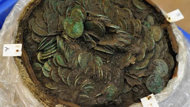 Discovery of buried coins in Wales turns out to be Roman treasure: "Huge surprise"