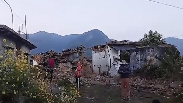 Nepal earthquake kills at least 157 and buries families in rubble of collapsed homes