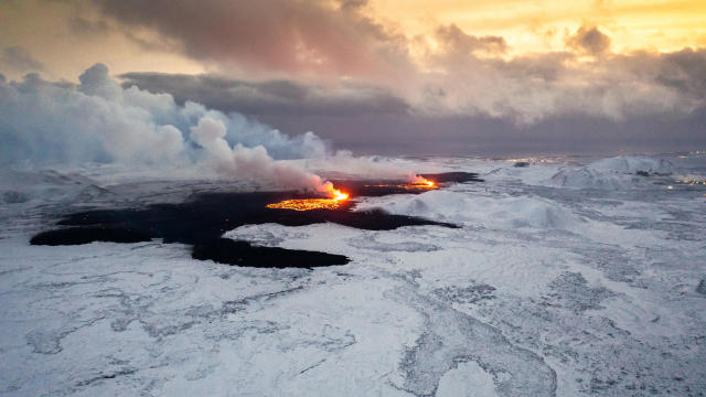 Photos of Iceland volcano eruption show lava fountains, miles-long crack in Earth south of Grindavik