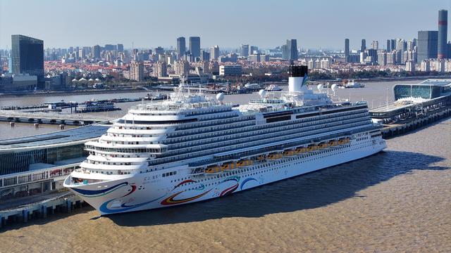 China's first domestically built cruise ship, the Adora Magic City, sets sail on maiden voyage