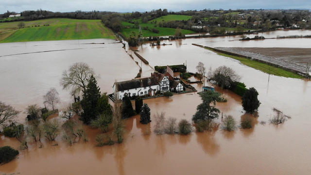 An Englishman's home has flooded nearly a dozen times in 7 years. He built a wall to stop it from happening again.