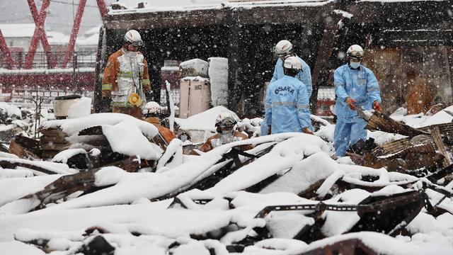 Japan earthquake recovery hampered by weather, aftershocks as number of people listed as missing soars