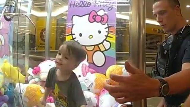 Australian police share video of officers rescuing 3-year-old boy who got stuck in a claw machine