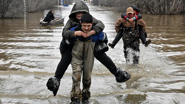 Flooding across Russia's west from melting mountain snow and ice forces mass evacuations