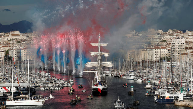 Olympic flame reaches France for 2024 Paris Olympics aboard a 19th century sailing ship