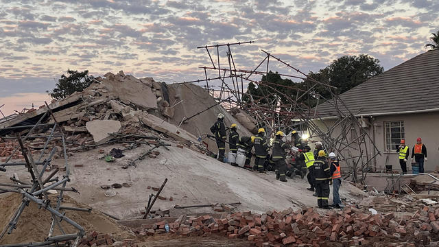 Hope for South Africa building collapse survivors fuels massive search and rescue operation