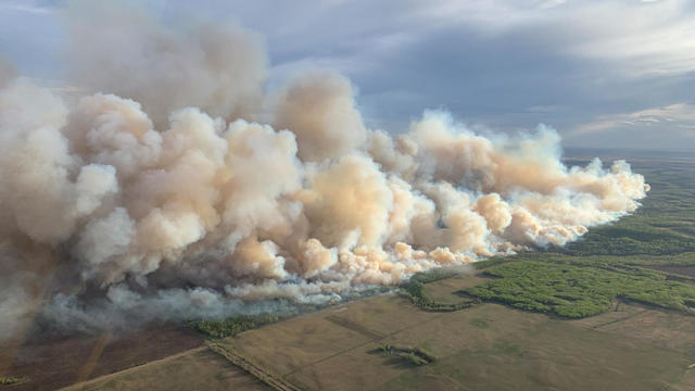 Wildfire in Canada forces thousands to evacuate as smoke causes dangerous air quality