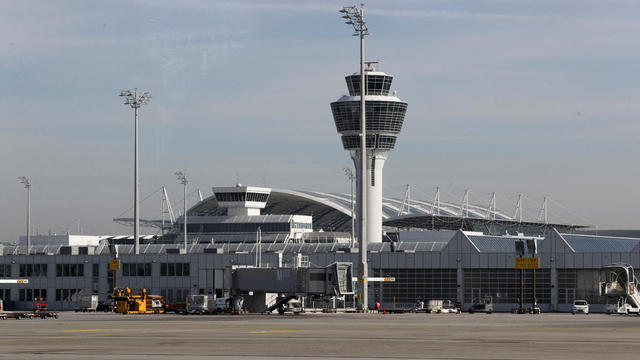 Climate activists glue themselves at Germany airport to protest pollution caused by flying