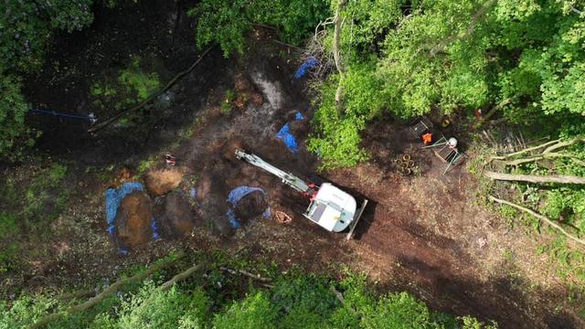 Archaeologists search English crash site of World War II bomber for remains of lost American pilot