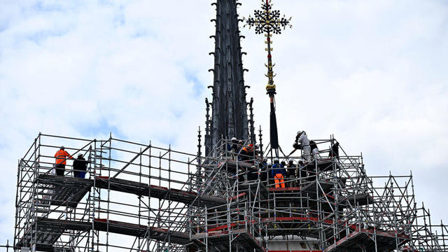 Cross restored to Notre Dame cathedral more than 5 years after fire