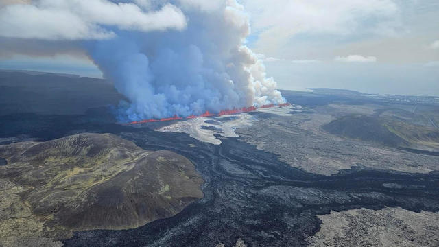 Watch Live: "Explosive" Iceland volcano eruption shoots lava across roads and sends pollution toward the capital