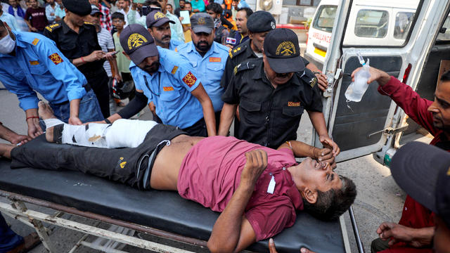 Bus carrying Hindu pilgrims to a shrine in India plunges down 150-foot gorge, killing 22 people