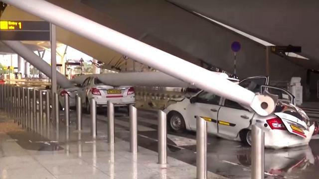 Massive roof section at Delhi international airport collapses in storm, crushing cars and killing one driver