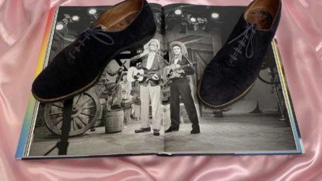 Elvis Presley's blue suede shoes sell at auction