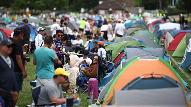 Meet the diehard tennis fans camped out in Wimbledon's epic "queue"