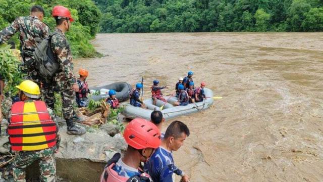 Landslide in Nepal sweeps 2 buses into monsoon-swollen river, leaving 51 people missing