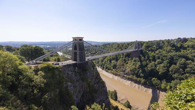 Man charged with murdering 2 roommates after body parts found in suitcases on iconic U.K. bridge