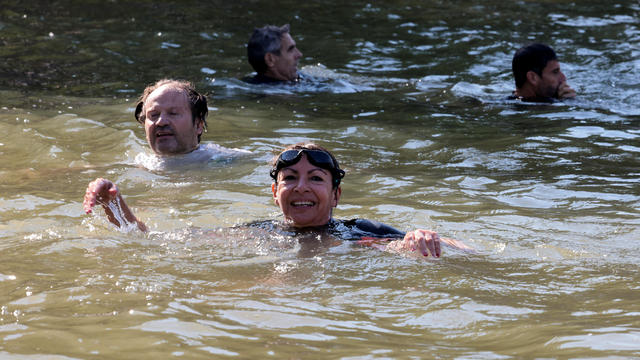 Paris Mayor Anne Hidalgo makes good on vow to swim in the Seine river to show its safe for the Summer Games