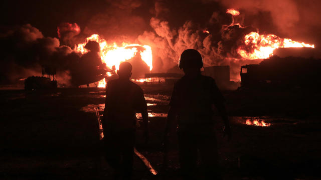 Yemen's Houthi-held port of Hodeida still ablaze 2 days after Israeli strike