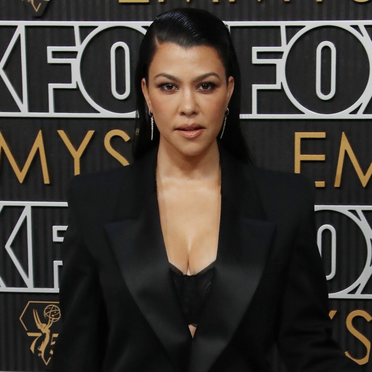 Kourtney Kardashian Cradles 9-Month-Old Son Rocky in New Photo