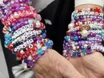 White women show support for Kamala Harris with Taylor Swift's Eras Tour-inspired blue bracelets